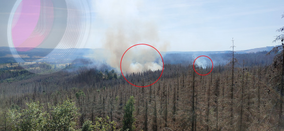 Rot markierter Waldbrand, links oben verblasst befindet sich eine IDS Industriekamera 