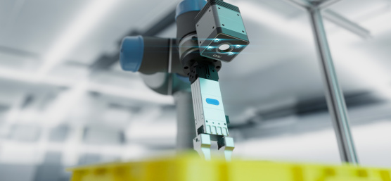 Roboterarm mit einer Nion 3D-Kamera über einer gelben Kiste