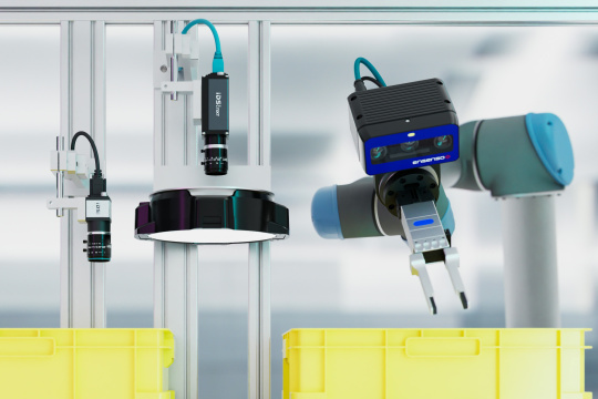 Drei Industriekameras von IDS die in einer Roboterzelle arbeiten