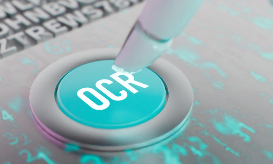 Weißer Knopf mit der Aufschrift "OCR"