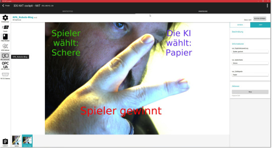 Sebastian Trella spielt Schere, Stein, Papier gegen einen simulierten Computergegner.