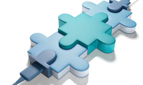 3 Puzzleteile, die links unten mit einem Kabel angeschlossen sind