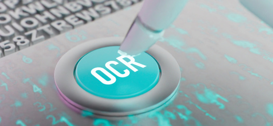 Weißer Knopf mit der Aufschrift "OCR"