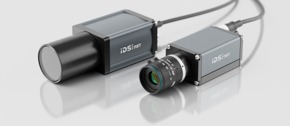 Two IDS NXT oslo and malibu AI cameras with lens and cable